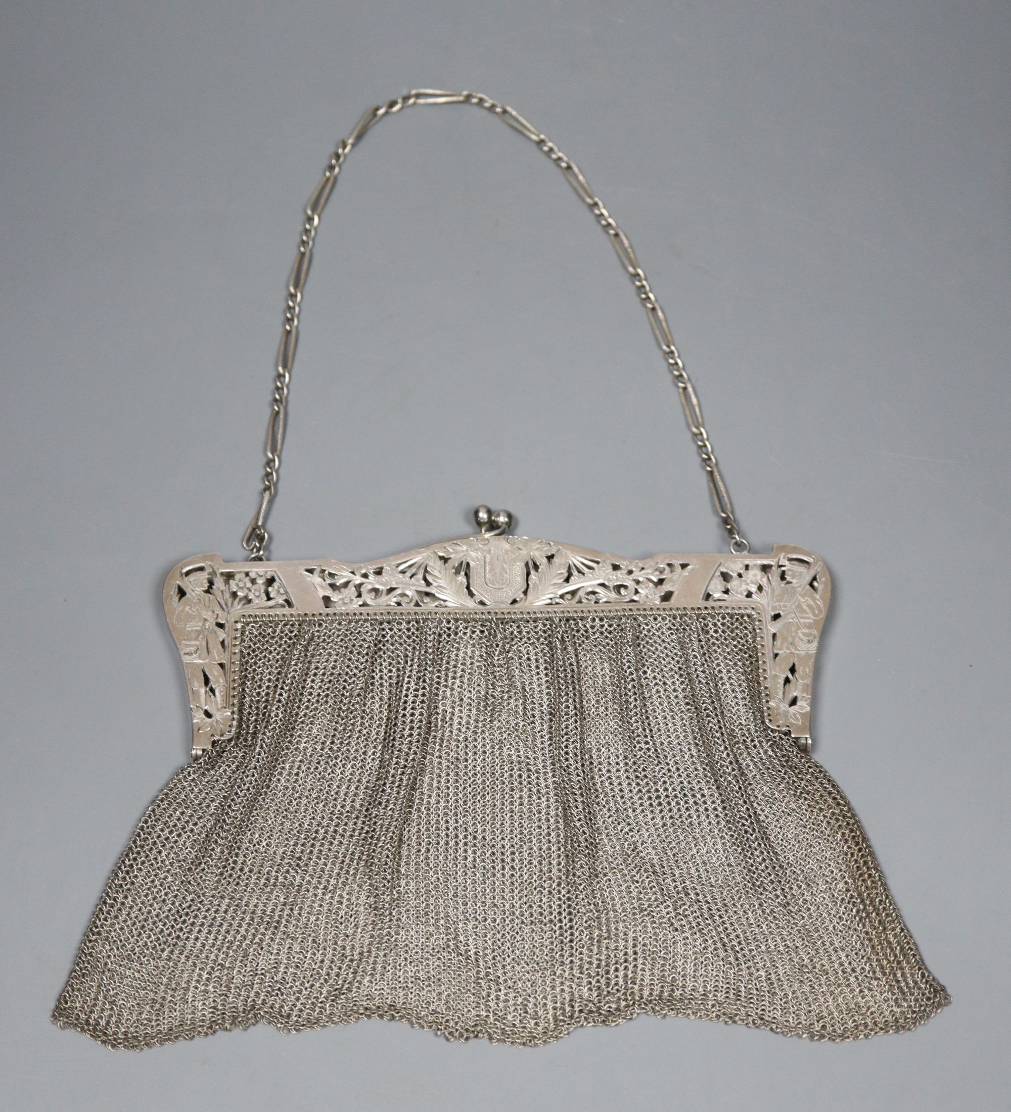 A sterling evening bag, the clasp engraved with a confederate soldier, gross 8oz.
